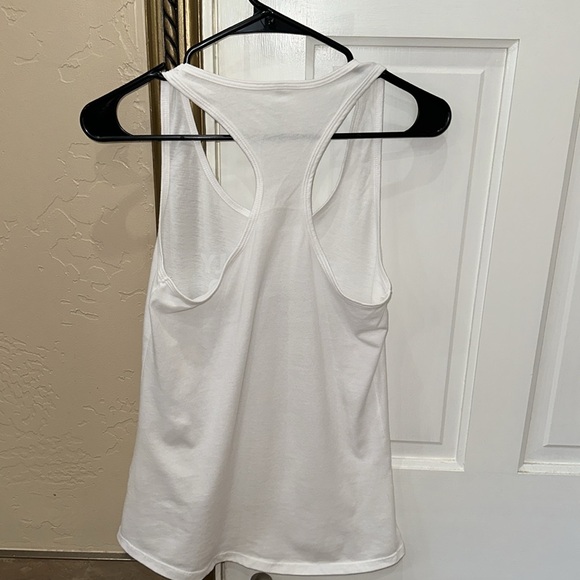 White tank “. Personally victimized by my Trainer”. - Picture 4 of 8